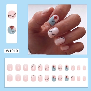Pink press-on nail kit with map map icon designs and black curves, model W1010