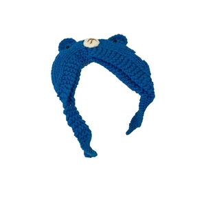Blue knitted baby hat with cute bear ears and muzzle design for winter warmth