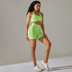 Detailed seamless texture of fluorescent green high-waisted yoga set for fitness