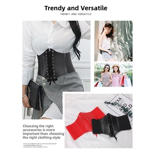 Detail of corset-style cinch belt showing lace-up front and high-elastic back band