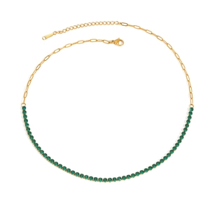 Detail of tennis necklace with green gemstones and 18k gold plated long link chain
