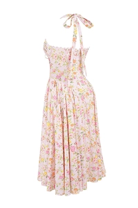 Detail of the back tie closure and floral print on a summer slim long dress