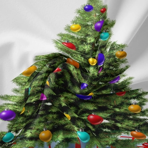 Detail showing the festive Christmas tree print on a soft white bohemian tapestry fabric
