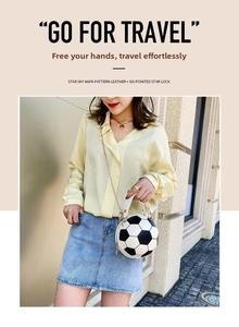 Detail of a soccer-shaped crossbody bag with Napa leather texture and golden metal chain