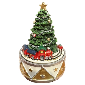 European vintage Christmas tree music box with rotating red train and gold drum base