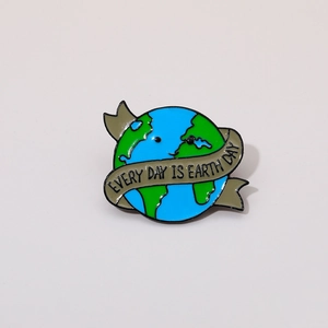 Close-up of cartoon Earth Day badge with Every Day is Earth Day text on white