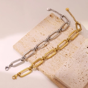 Chic paperclip chain bracelet with metallic beads in gold and silver steel finish