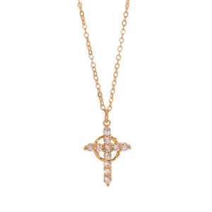 Elegant gold cross necklace with sparkling crystal rhinestones on a white background