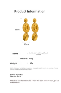 Macro detail of gold oval textured earrings showing 11cm length and wrinkled finish