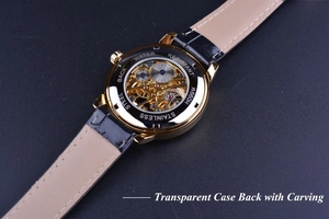 Macro shot of the transparent case back showing skeleton mechanical movement and gold finish