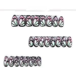Detail of 24pcs almond butterfly fake nails with pink and teal iridescent pearl texture