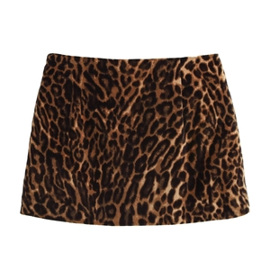 Detailed flat lay of women's mini skirt with classic brown leopard print pattern