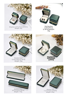 Detailed view of dark green leather jewelry boxes with elegant gold rim and measurements