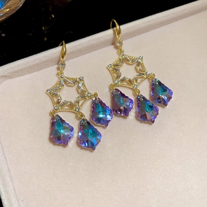 Detail of star frame earrings with tassel waterdrop crystals and AB coating