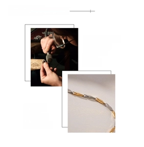 Detailed macro view of 18K gold plated two-tone geometric chain with polished finish