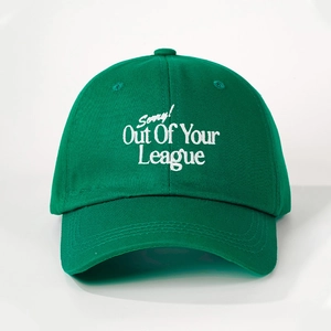 Green cotton baseball cap with white Out Of Your League embroidery and adjustable strap