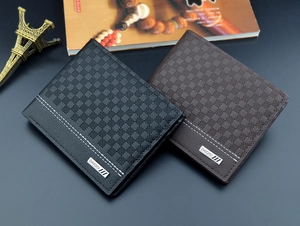 Detailed view of the checkered embossed leather wallet interior and textured material