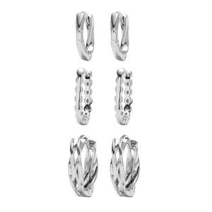 Three pairs of minimalist silver earrings featuring twisted and geometric textures on white