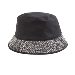 Macro shot of silver rhinestones detail on black cotton disco bucket hat brim