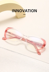 Close-up of pink gradient eyeglasses frames with metal core temple and size details