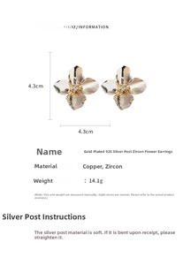 Detailed view of gold flower earrings with zircon inlays and 925 silver needles