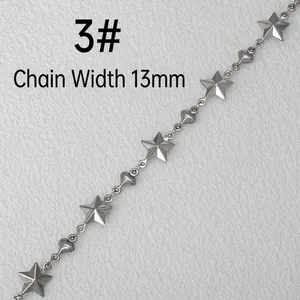 Close-up of 13mm wide stainless steel chain with hollow star and heart links