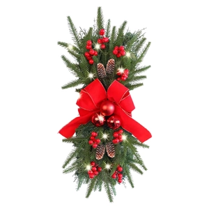 Christmas staircase wreath with pine cones, red bows, and LED lights on a white background
