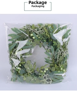 Close-up of artificial berry and eucalyptus wreath inside clear plastic packaging bag