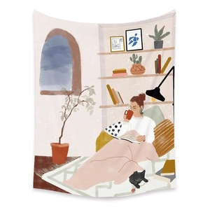 Detail of bohemian indoor tapestry featuring a cozy reading illustration with a soft texture