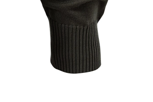 Detail of dark grey ribbed knit cuffs on long sleeve sweater for a snug and comfortable fit