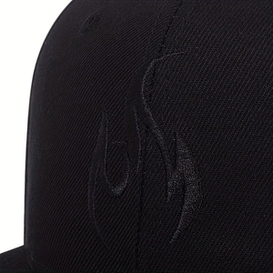 Close-up of high-quality black flame embroidery on cotton twill hip-hop baseball cap