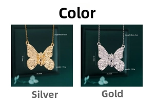 Detailed view of the 32.1mm butterfly pendant with 40cm plus 5cm adjustable steel chain