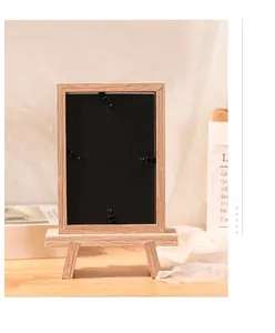 Rear view of 6-inch wooden photo frame with black backboard and mini easel stand