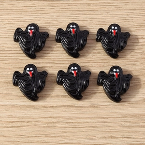 Detailed view of six black ghost resin accessories for DIY Halloween crafts and phone cases