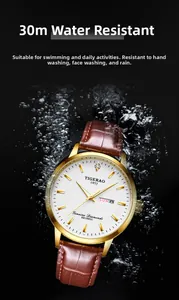 Waterproof gold watch detail showing calendar window and leather strap against water splashes