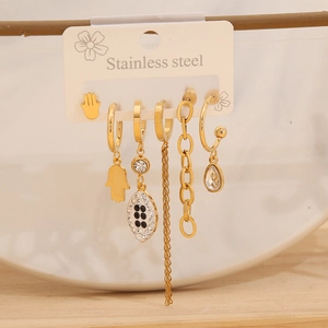 Detailed set of gold stainless steel earrings featuring Hamsa Hand and Evil Eye charms