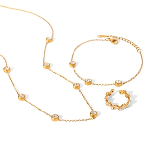 Three-piece golden stainless steel jewelry set with round zircon necklace, bracelet and ring