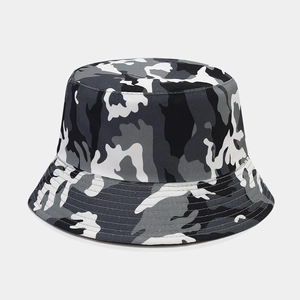 Detailed close-up of durable canvas camouflage bucket hat featuring a grey and white pattern