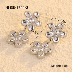 Detailed view of silver flower tassel earrings showing 2.49cm length and 6.8g weight