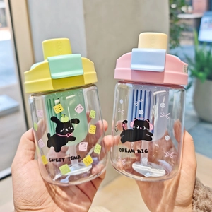 Close-up of cute cartoon plastic water bottles with straws and filters in dual-color lids