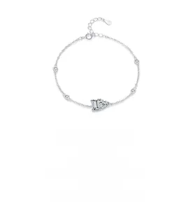 Macro detail of S925 sterling silver chain featuring emerald and heart-cut zircons