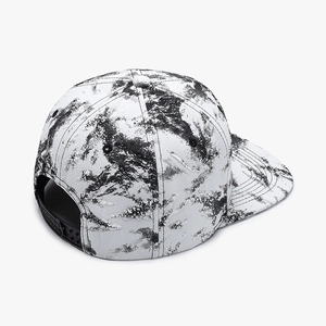 Flat brim snapback hat featuring black and white marble tie-dye print with adjustable strap