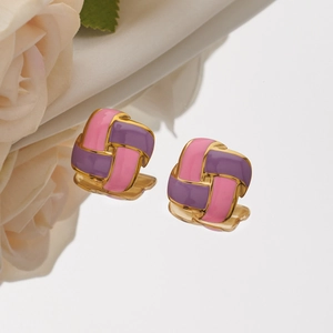 Elegant gold square woven earrings with pink and purple enamel on white rose background