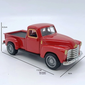Detail view of 1950s vintage red pickup truck model measuring 11cm by 4.2cm by 4cm