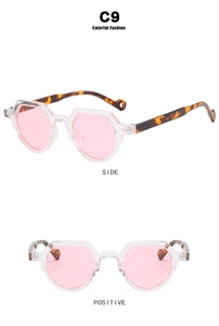 Detaillierte Seiten- und Frontansicht der runden Retro-Sonnenbrille mit rosa Gläsern C9