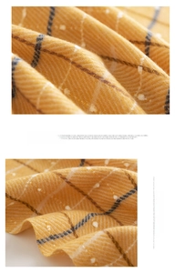 Close-up of yellow plaid scarf showing soft boucle texture and breathable warm fabric