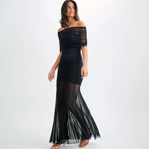Elegant black off-shoulder mesh midi dress with ruched details and sheer hemline