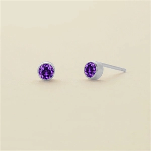 Minimalist round stud earrings with purple amethyst zircon in polished silver finish