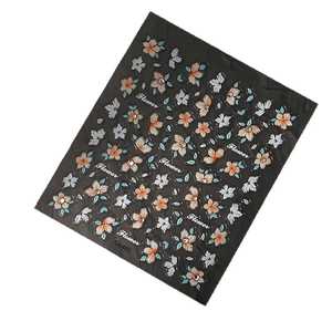 3D floral nail art stickers with pink flowers and butterfly motifs on white background
