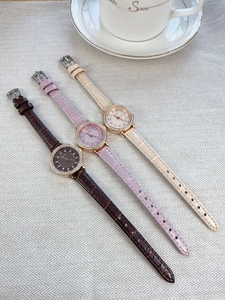 Elegant women's rhinestone watches in brown, purple and beige with leather straps